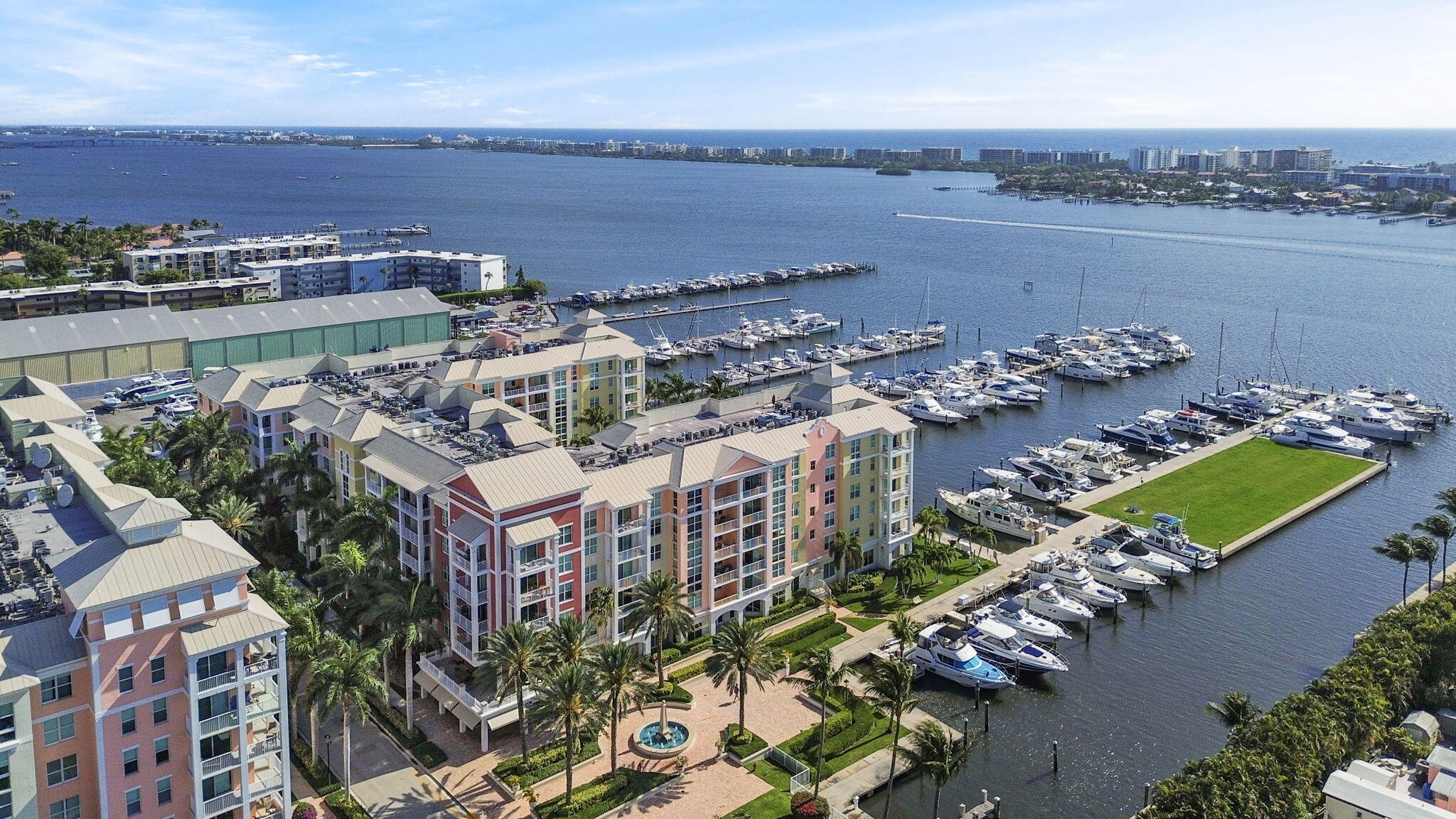 an aerial view of a residential building and lake view