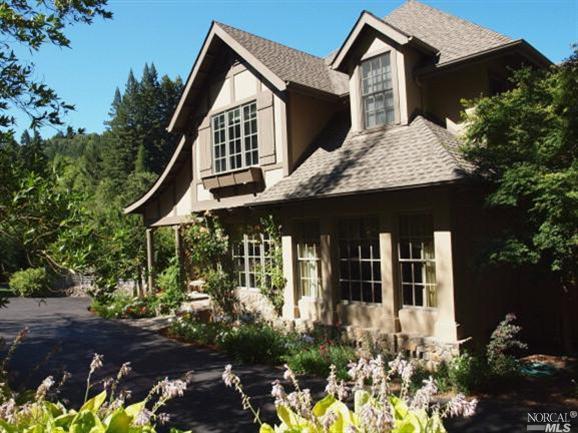 front view of a house with a small yard