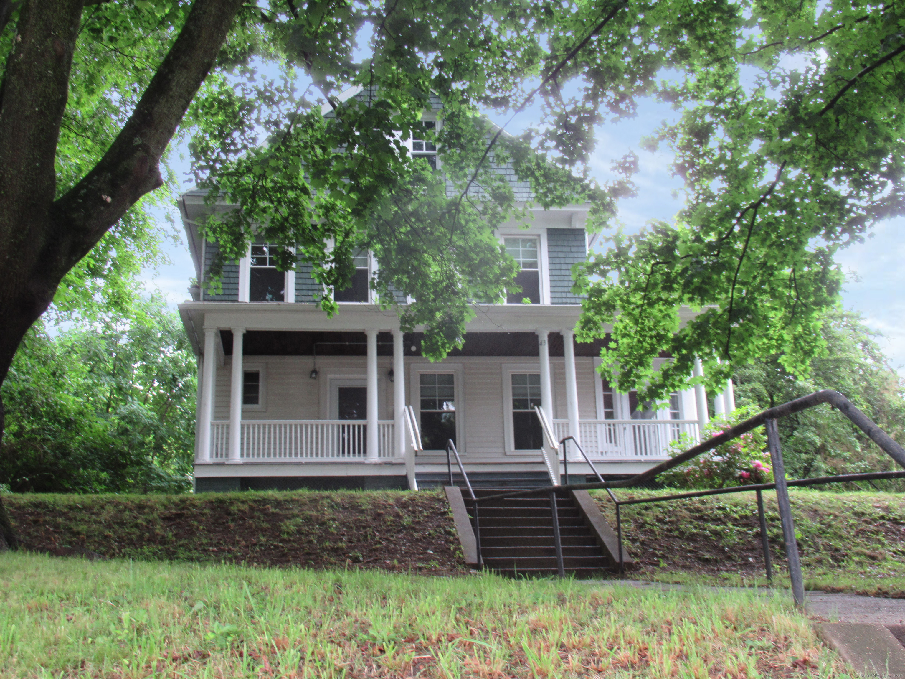 a front view of house with a yard