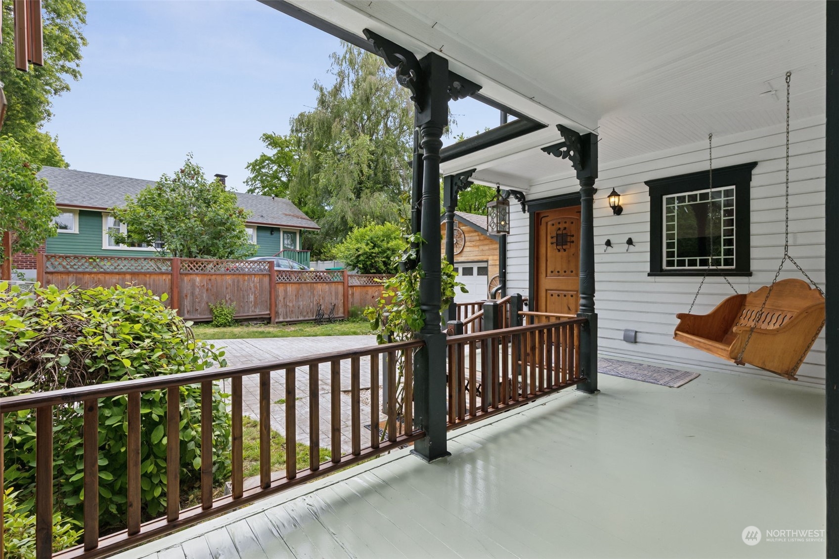 a view of a porch with furniture