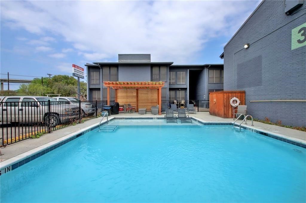 an outdoor space with patio and garden