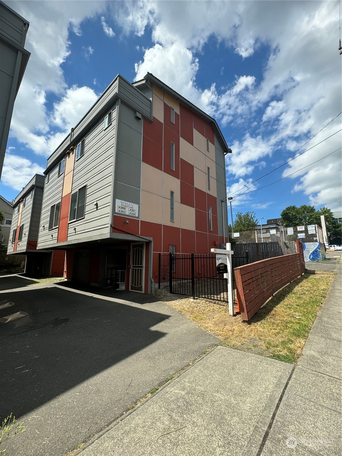 a view of a building with a street