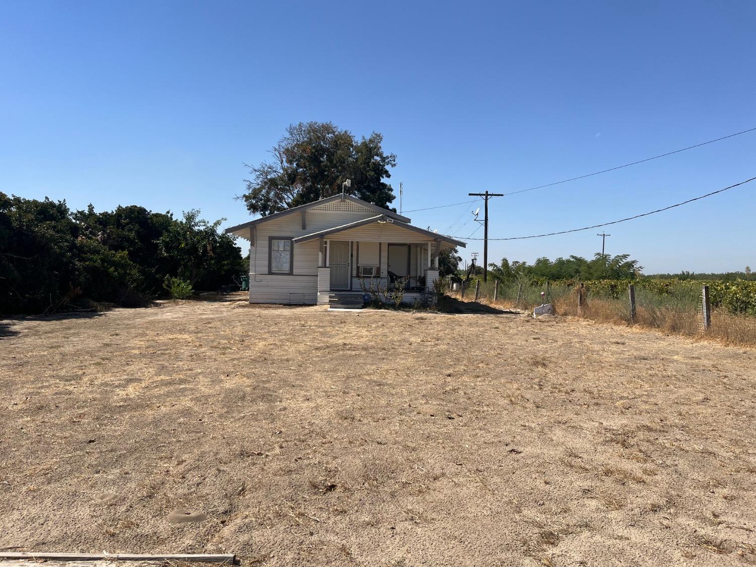 a view of a large house with a yard