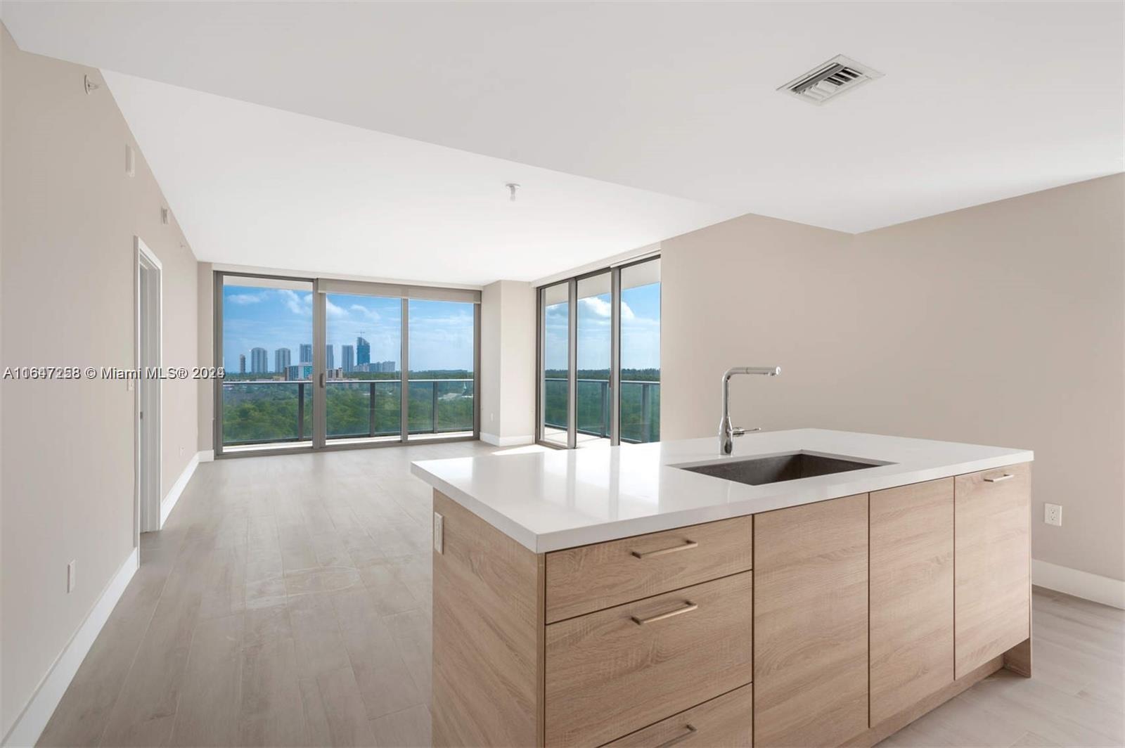 a room with sink and window