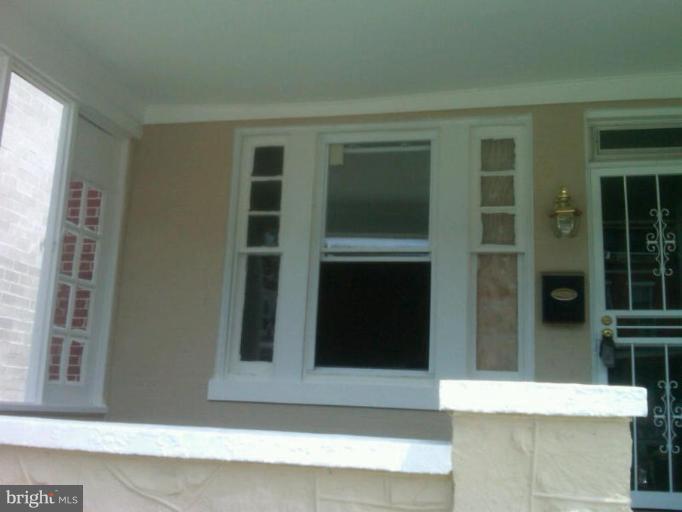 a view of entryway with a front door