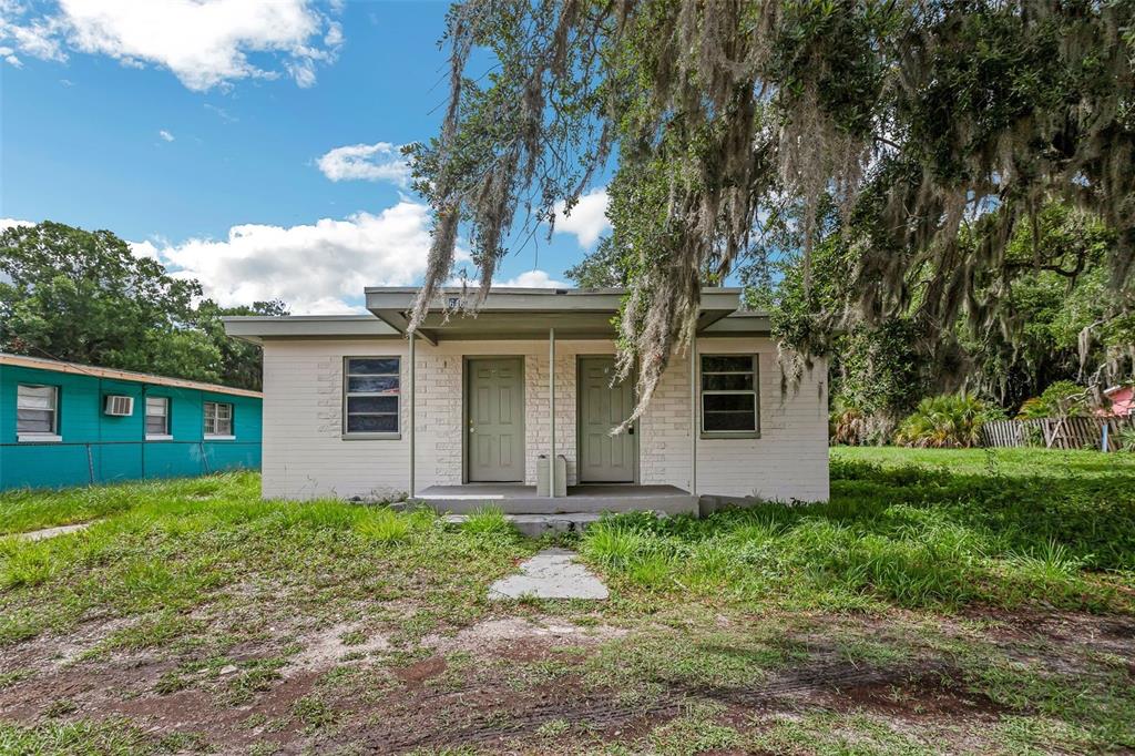 front view of a house with a yard