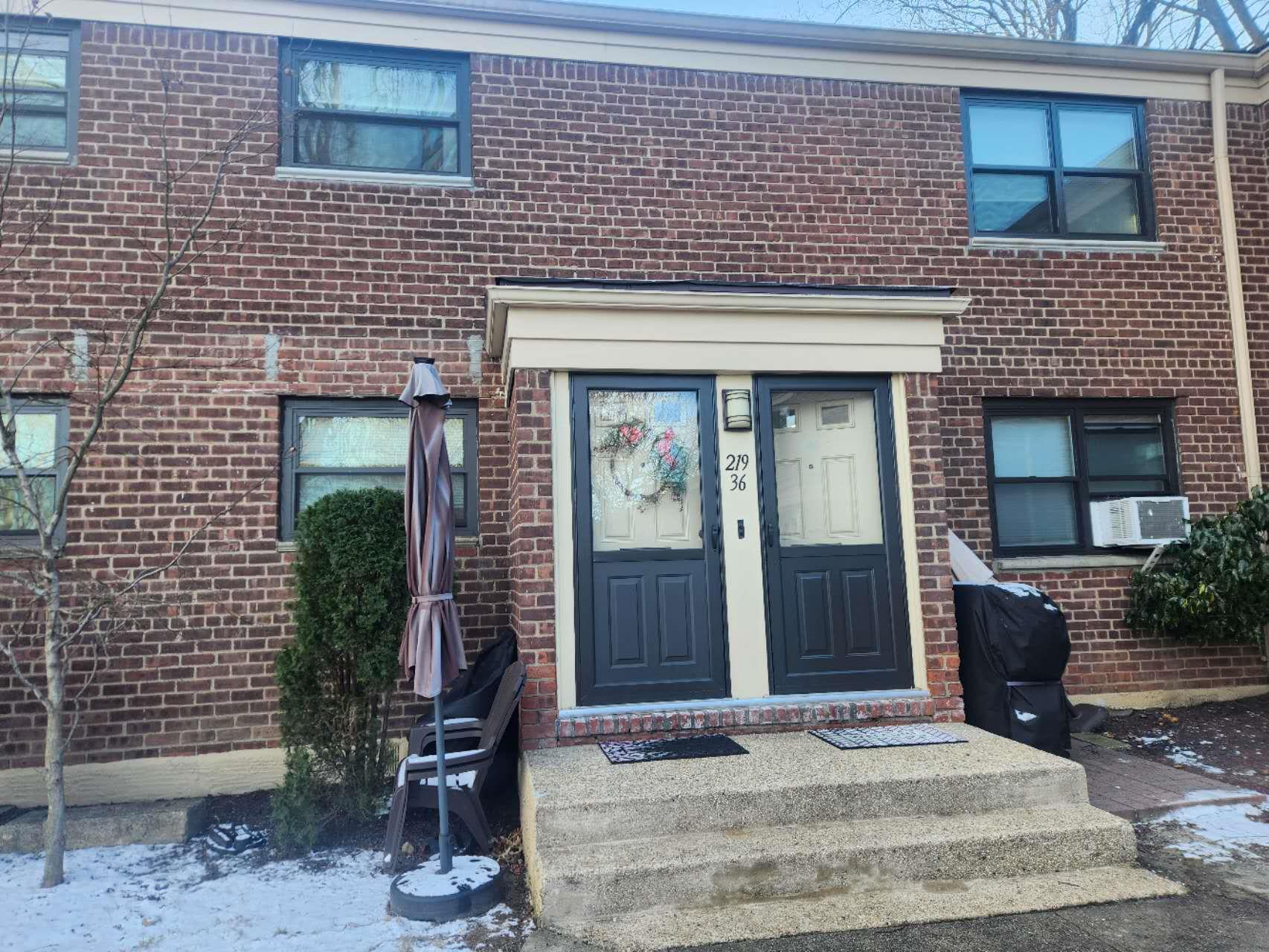 View of snow covered property entrance