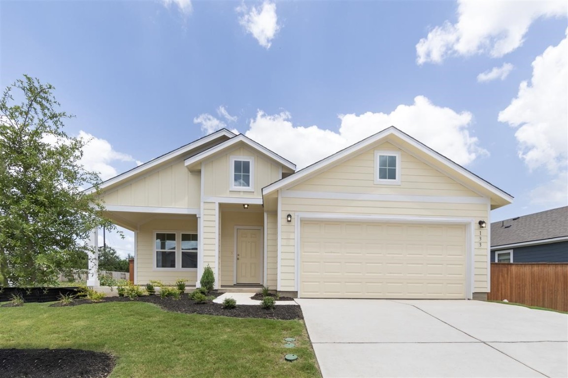 a front view of house with yard