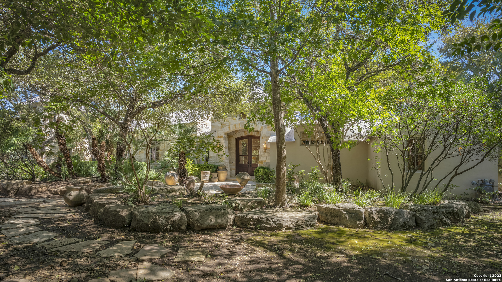 a view of a garden with a tree