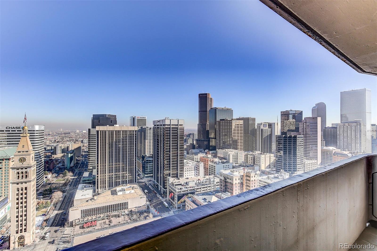 a view of a city with tall buildings