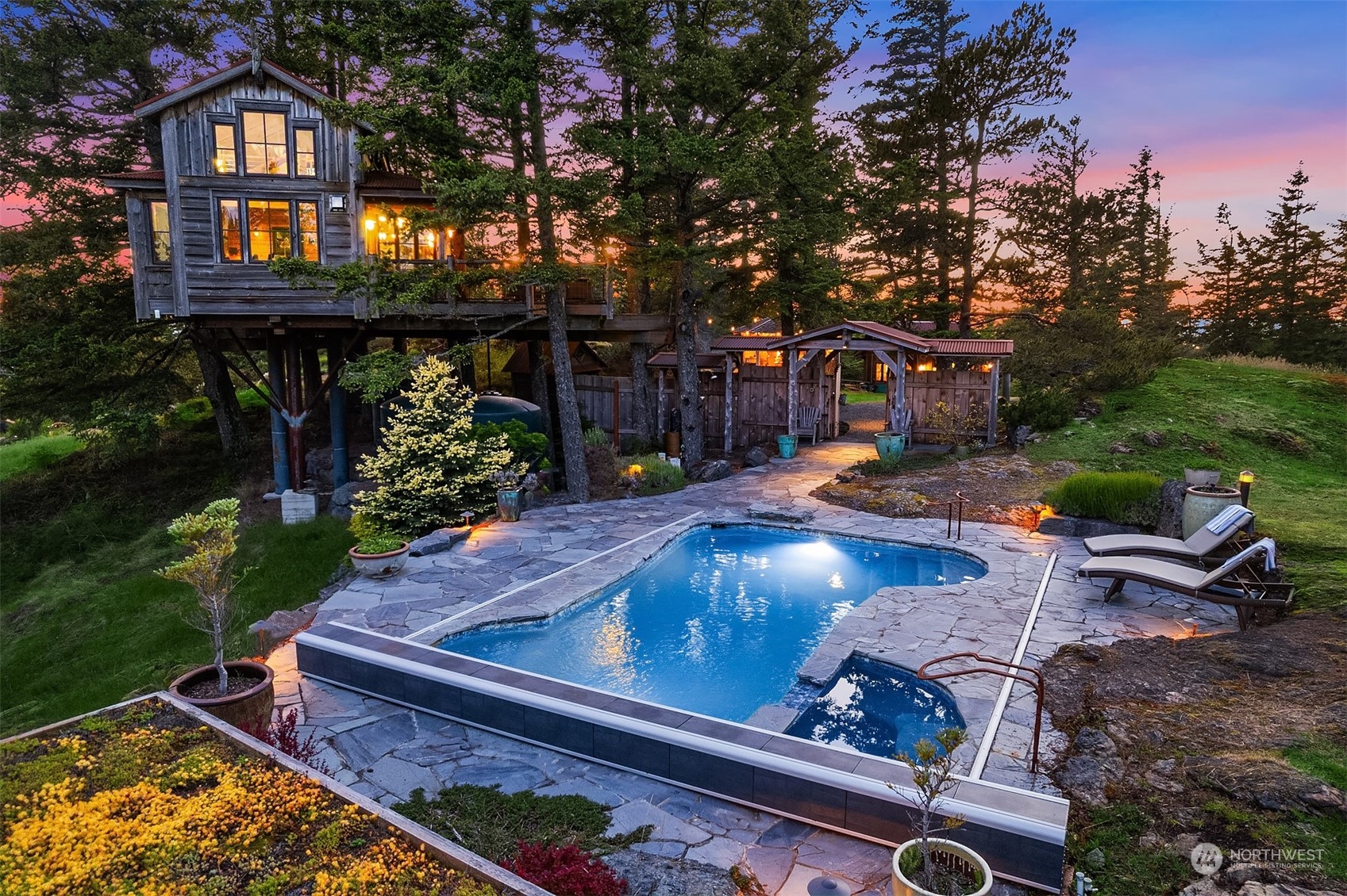 a view of a backyard with sitting area and furniture