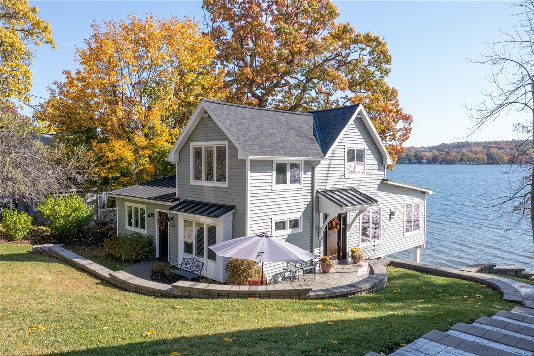 Picture of the main house with gorgeous lake and f