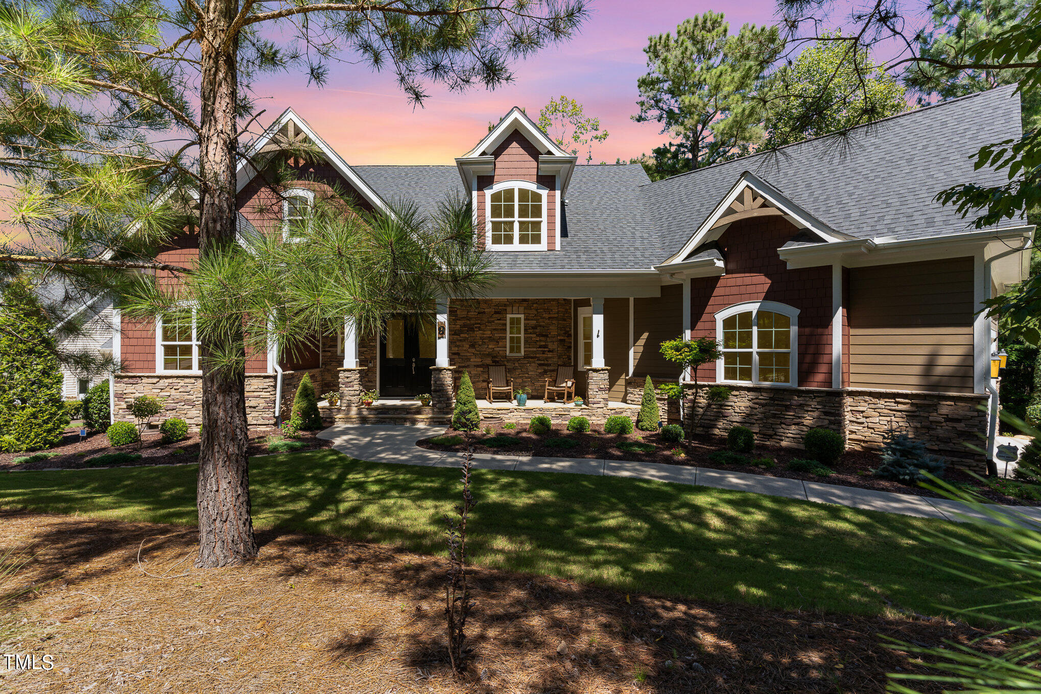 front view of a house with a yard