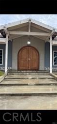 a view of the entryway of a house