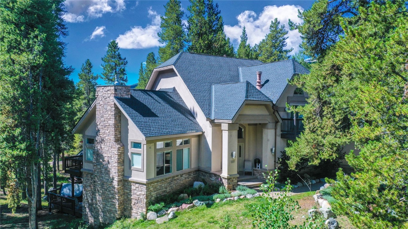 front view of a house with a small yard