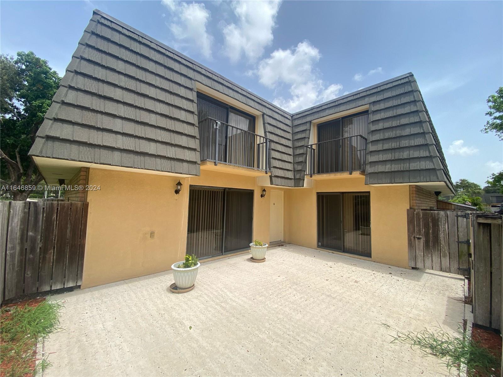 a view of a house with a garage