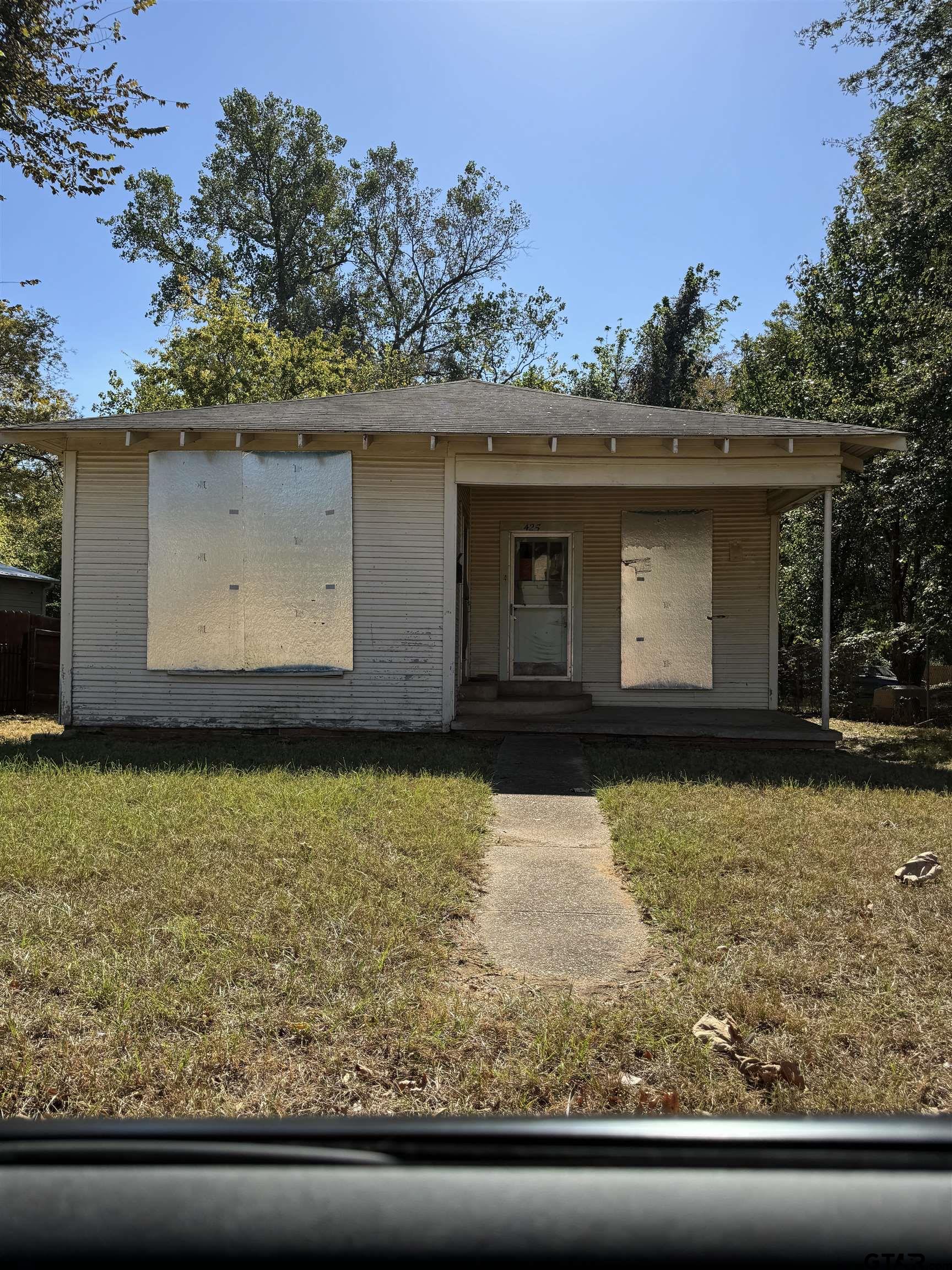 a front view of house with yard