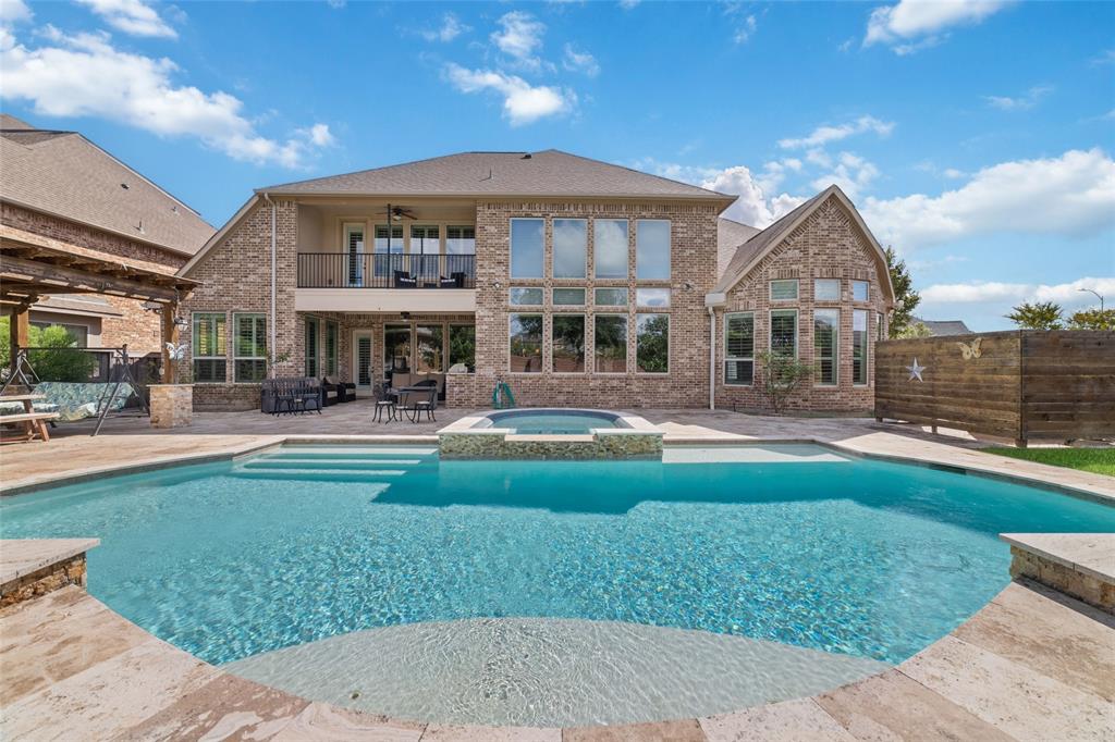 a view of a house with a swimming pool