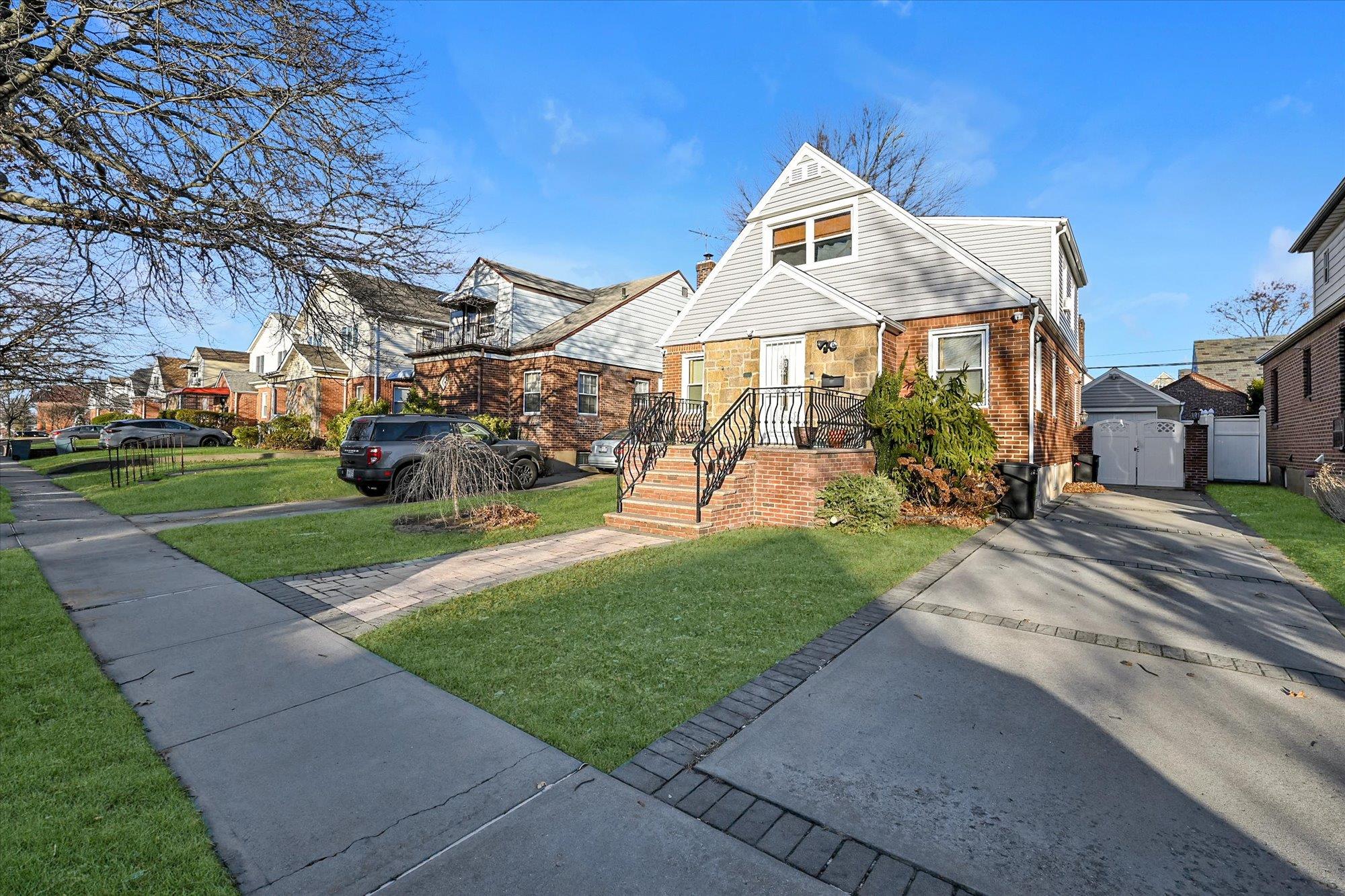 View of front of house with a front lawn