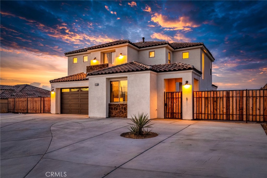 a view of a house with a garage