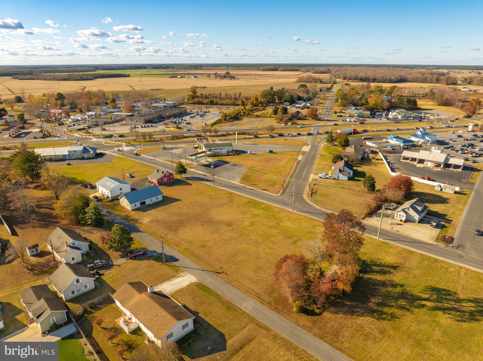 an aerial view of residential building and ocean view