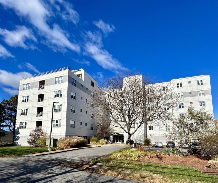 a view of building with large windows