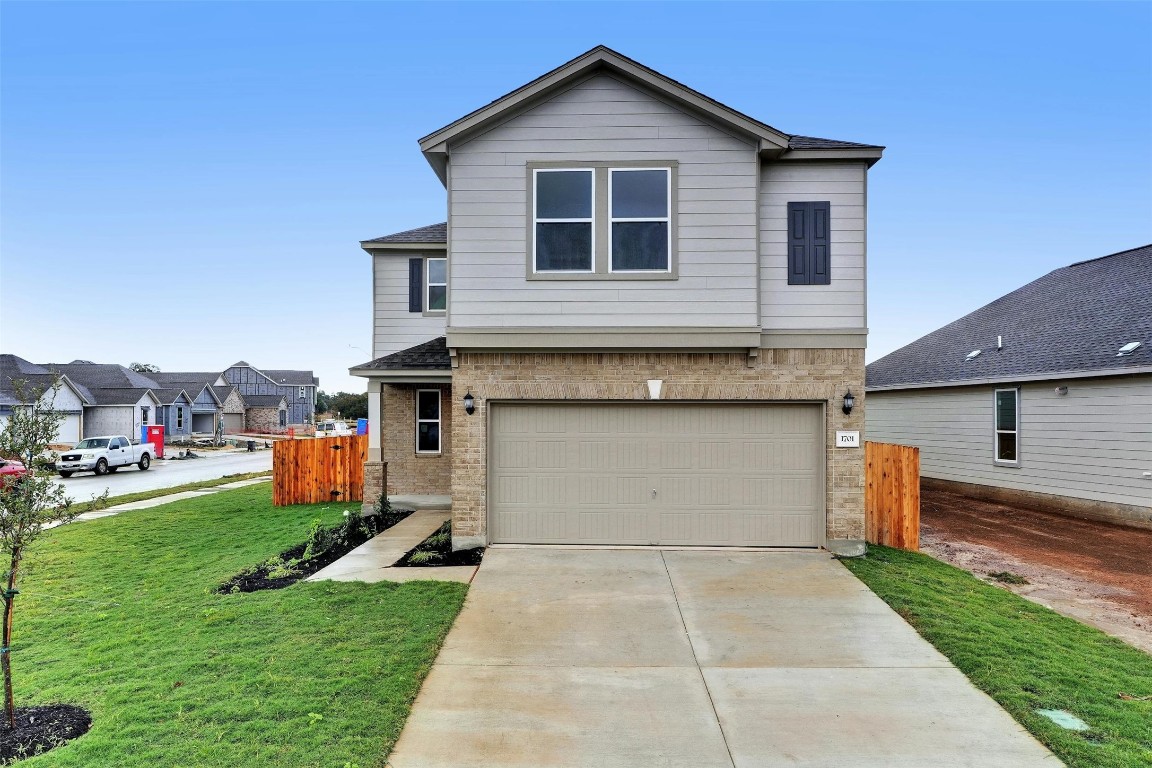 a front view of house with yard