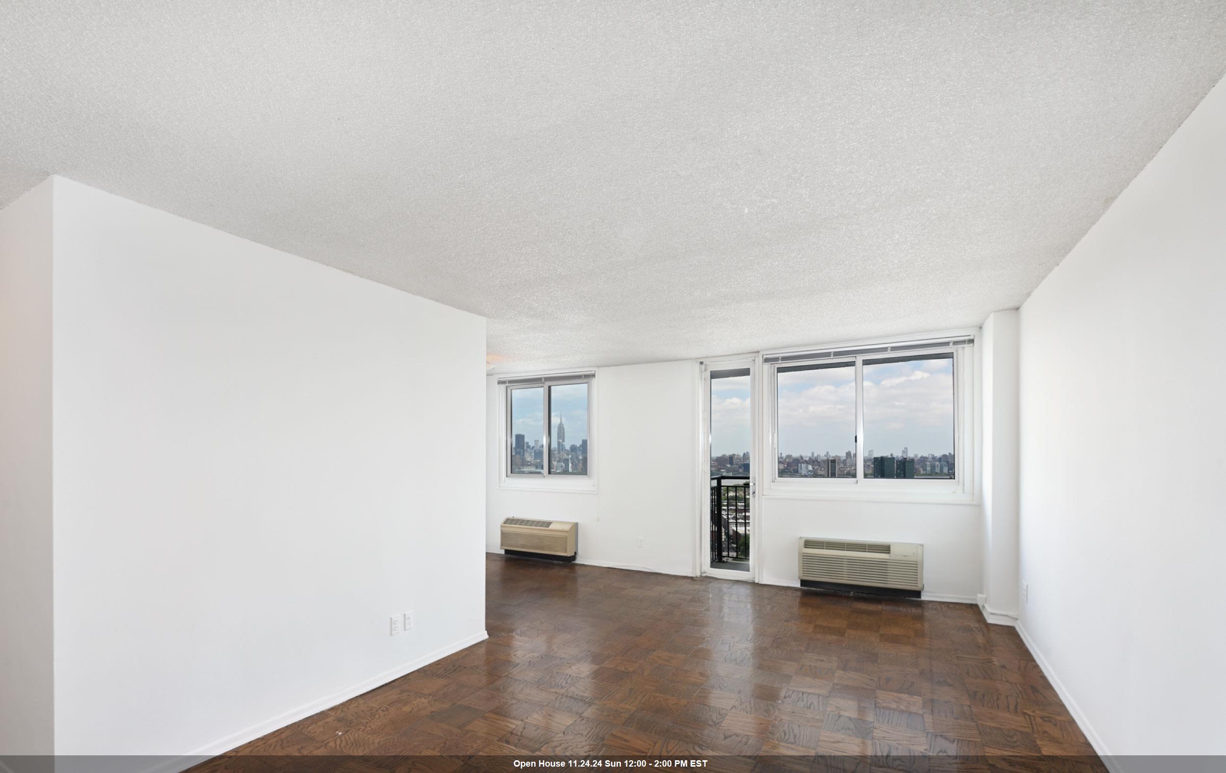 a view of a livingroom with a sink and a living room