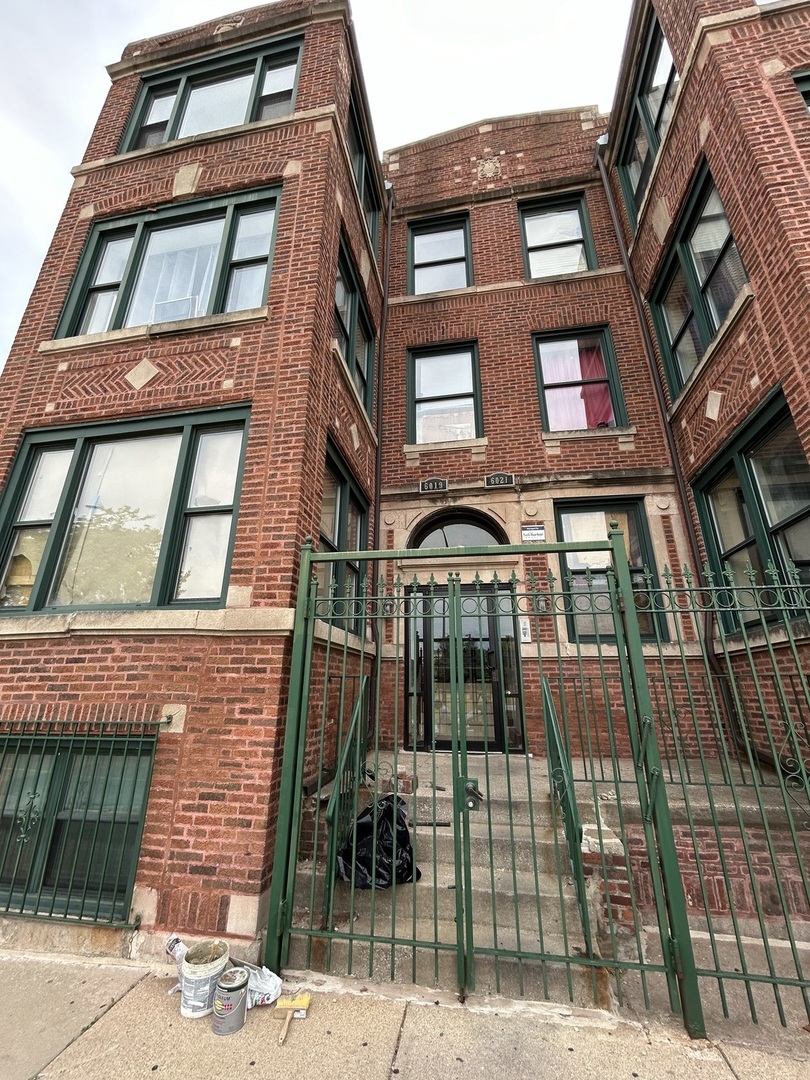 a front view of a multi story residential apartment building