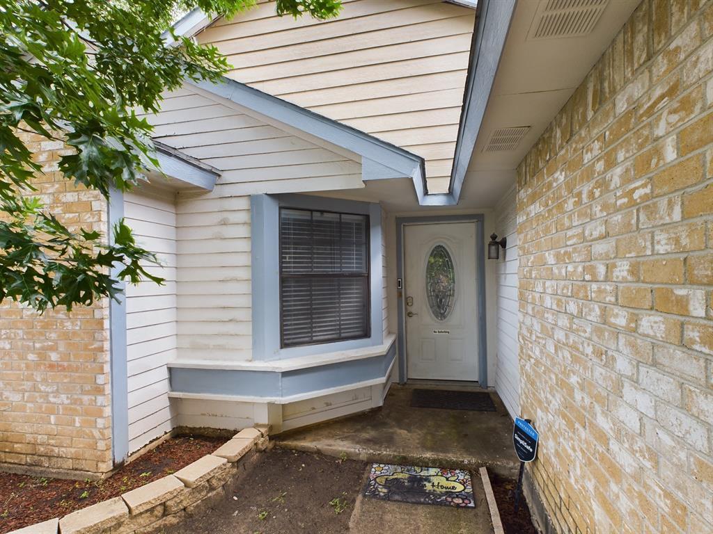 a front view of a house with a garage