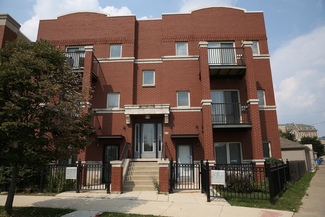 a front view of a building with street view