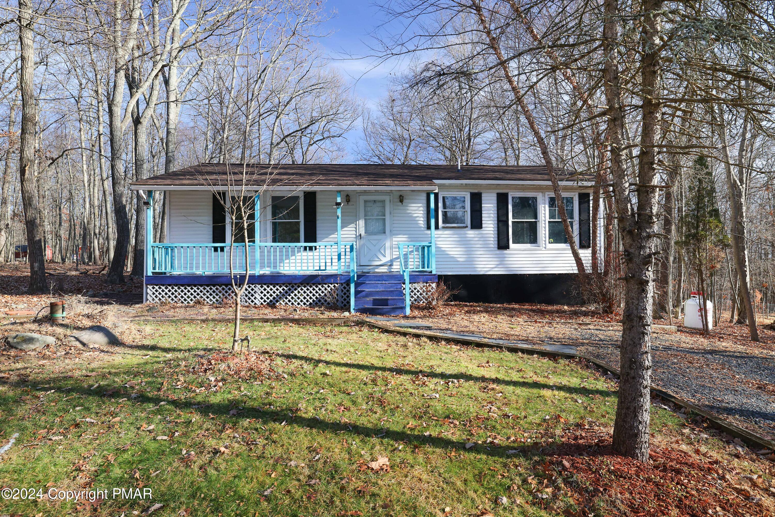 front view of a house with a yard