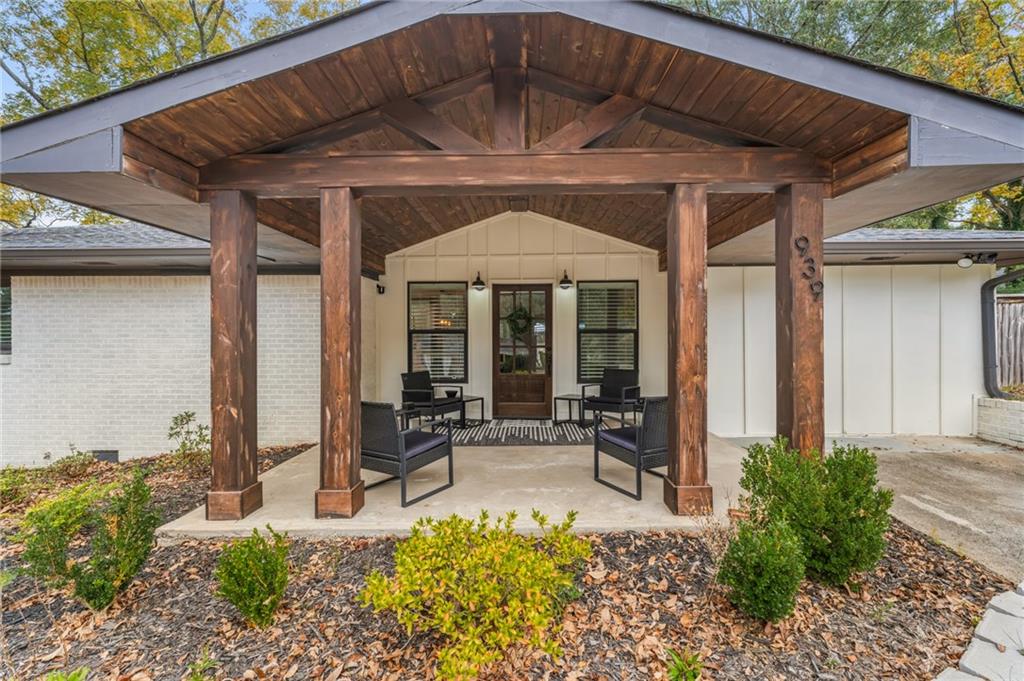 a front view of house with yard outdoor seating and entertaining space