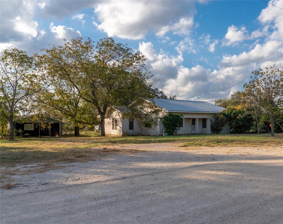 a view of a yard in front of a house