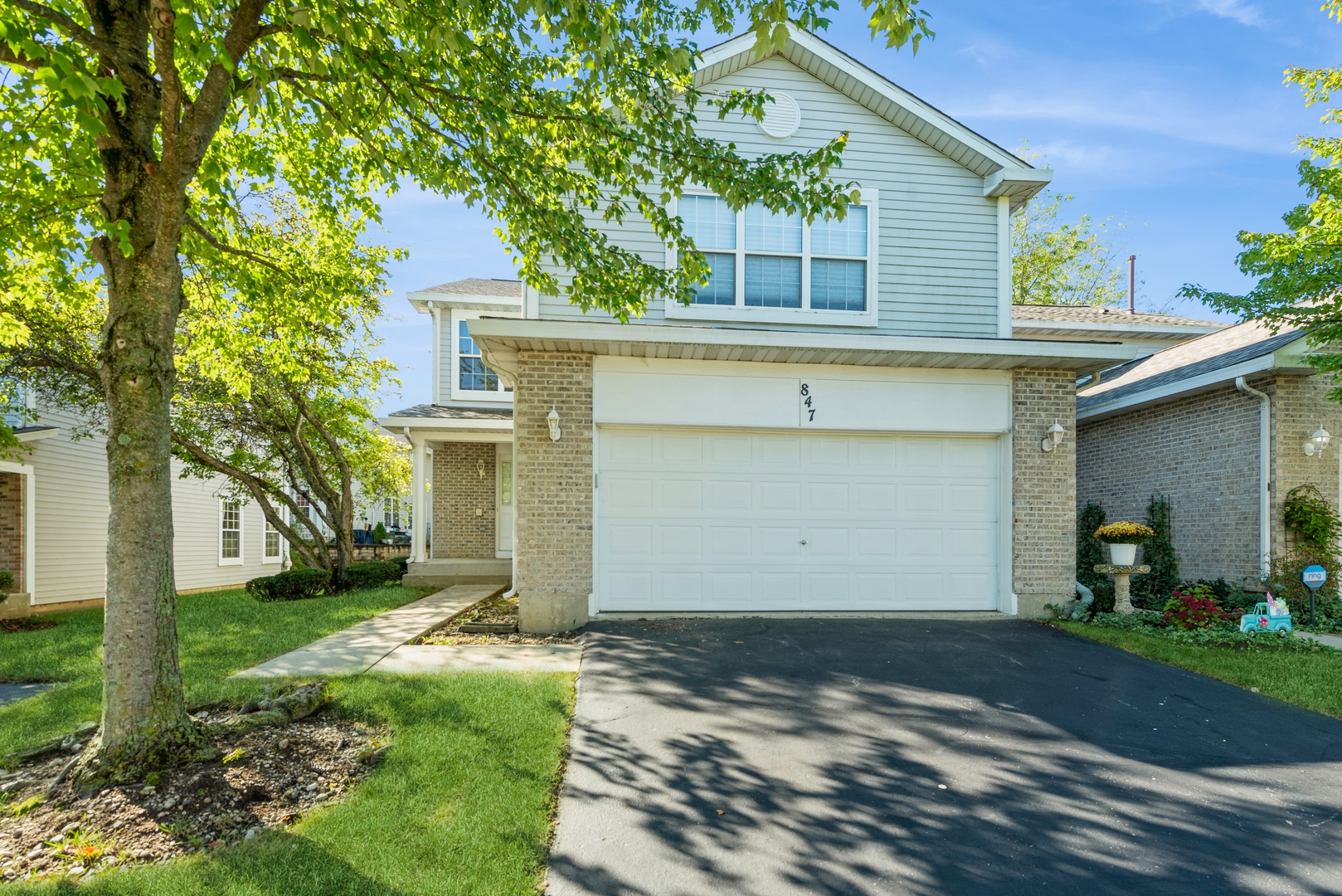 a front view of house with yard