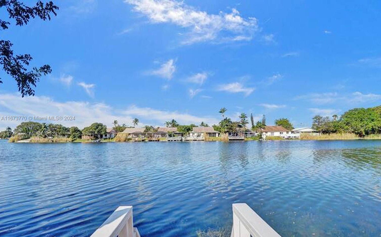 a view of a lake with a lake in the background