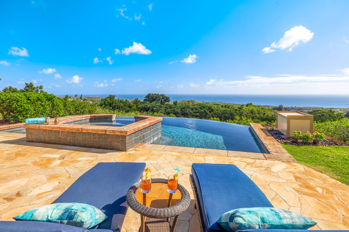 a view of a patio with swimming pool