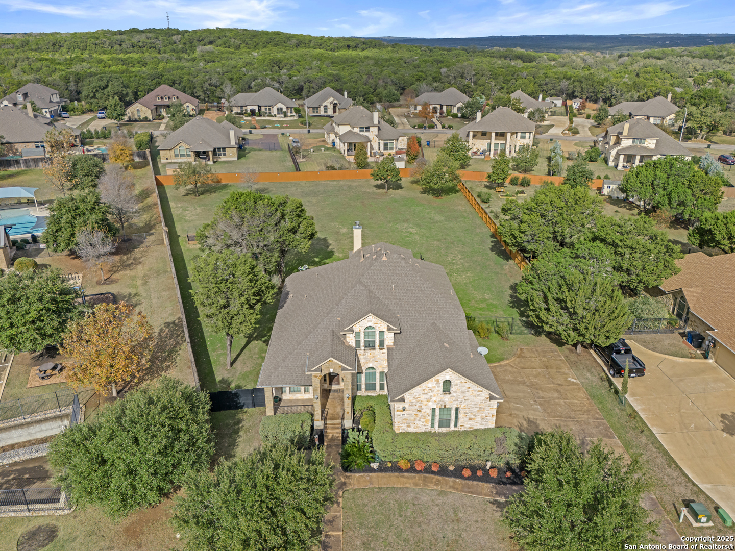 an aerial view of a house with a garden