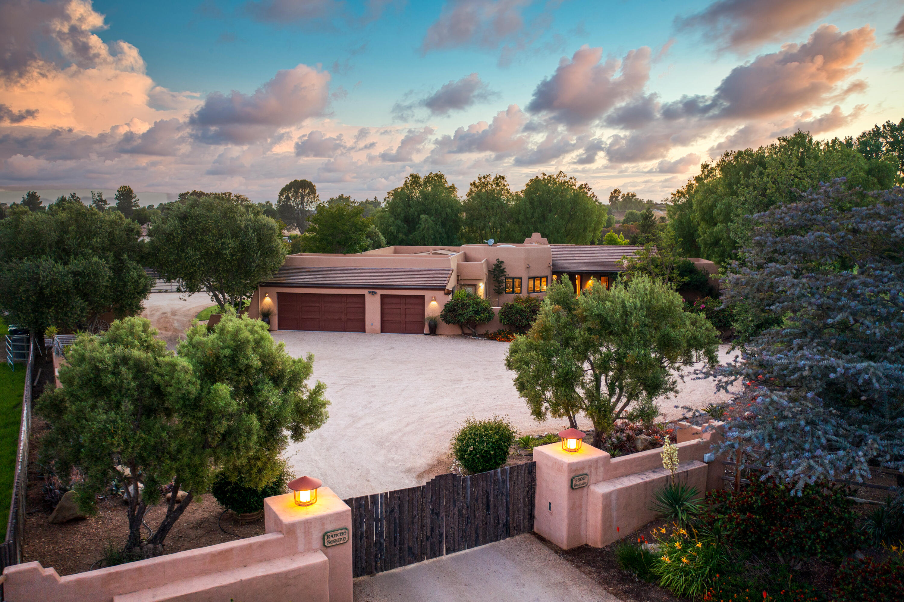 aerial view of a house with a yard