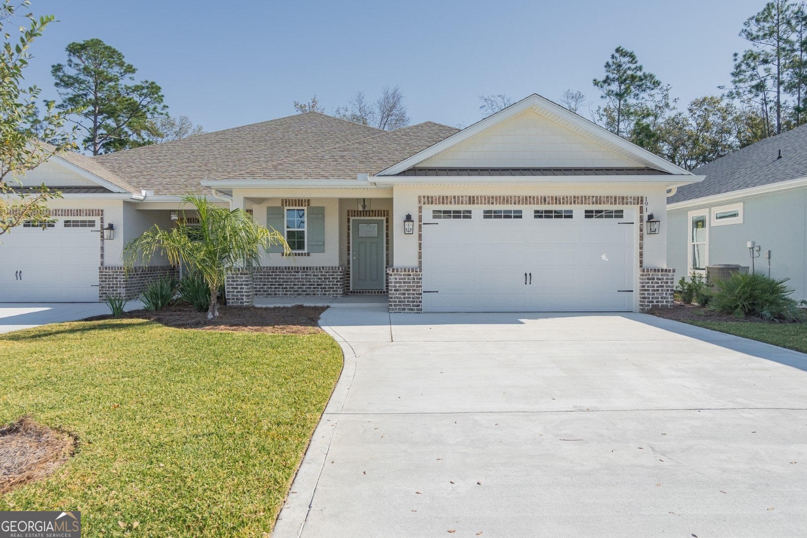 a front view of house with yard