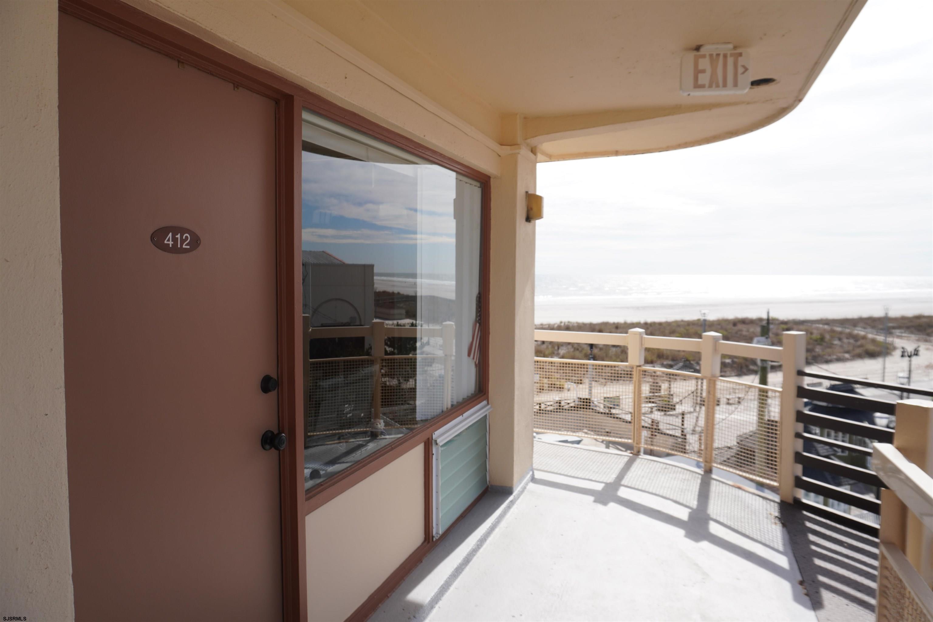 a view of a balcony and an outdoor space