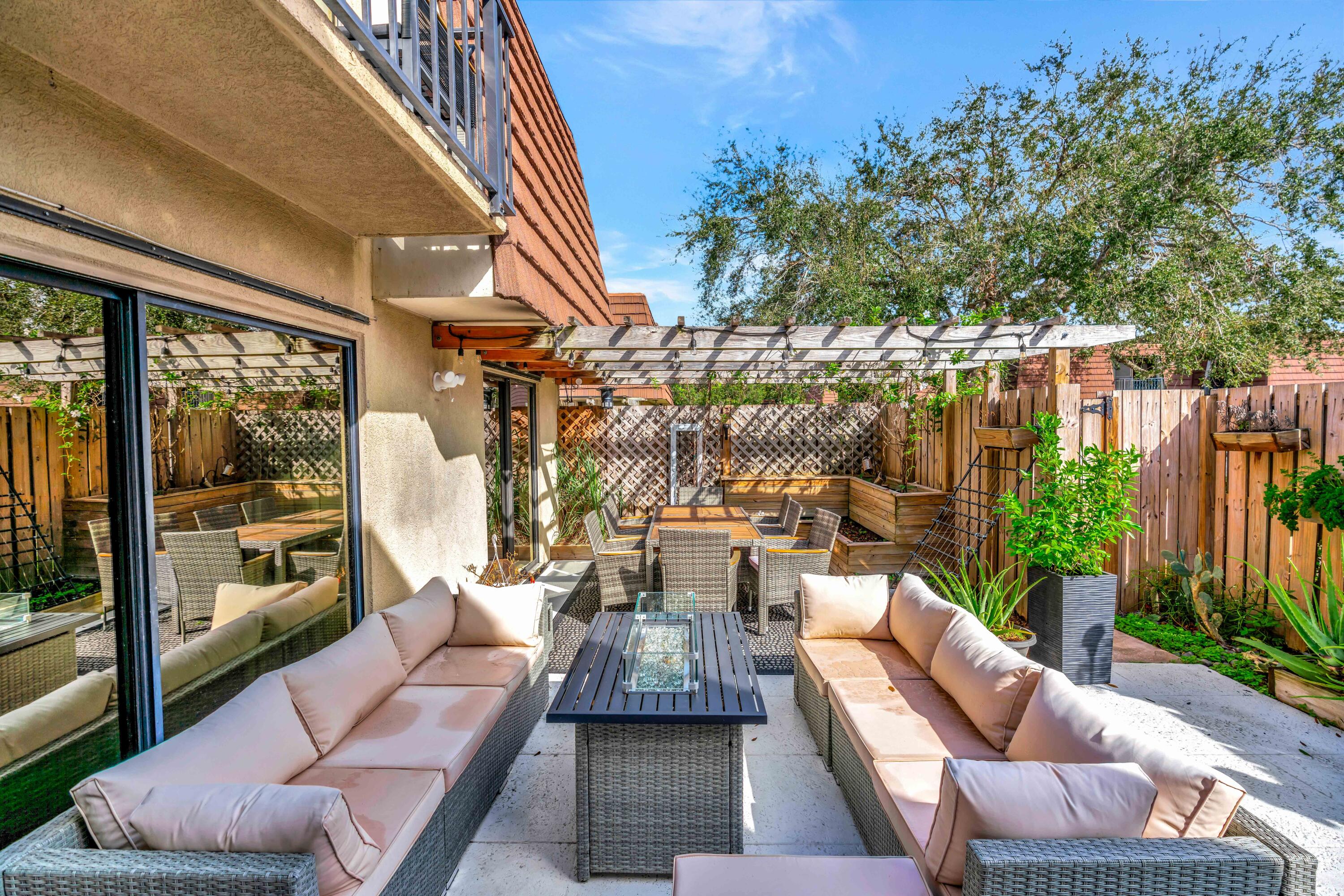 a outdoor living space with furniture and garden view