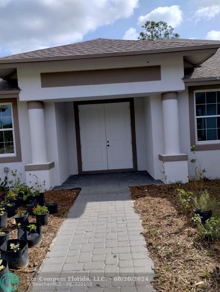 a view of a pathway of a house