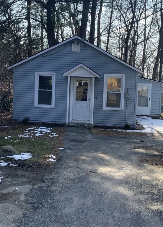 a front view of house with yard