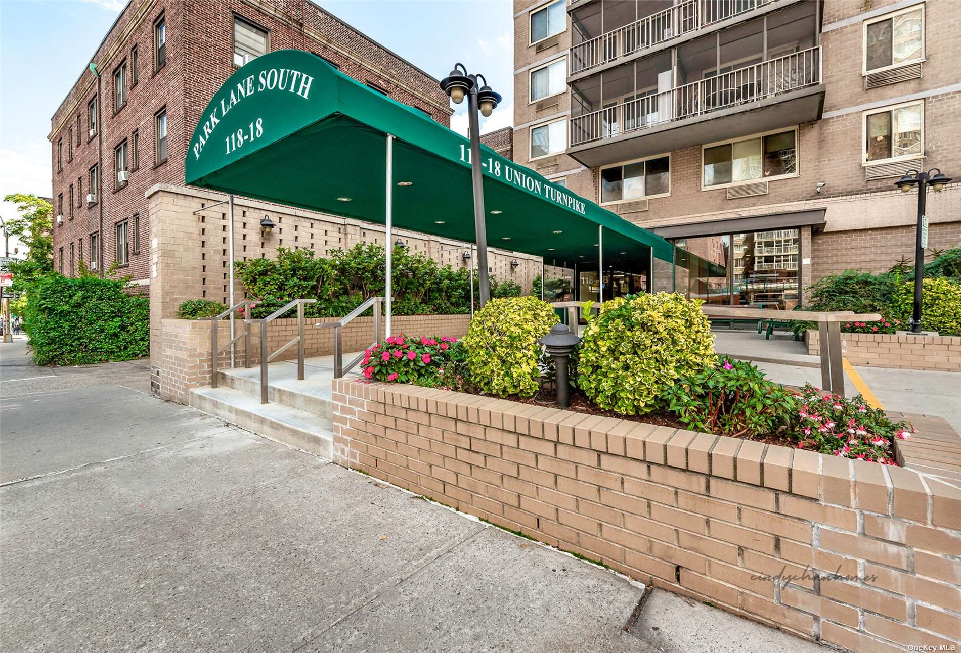 a view of a chair and table in the patio