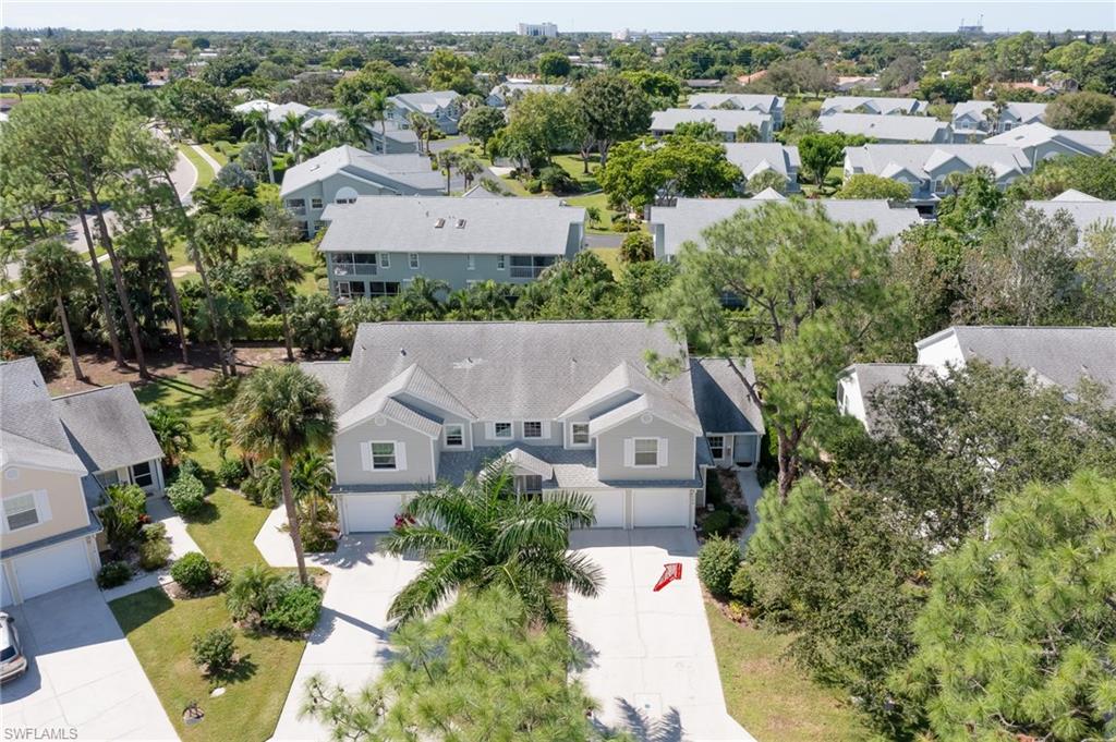 an aerial view of a house with a garden