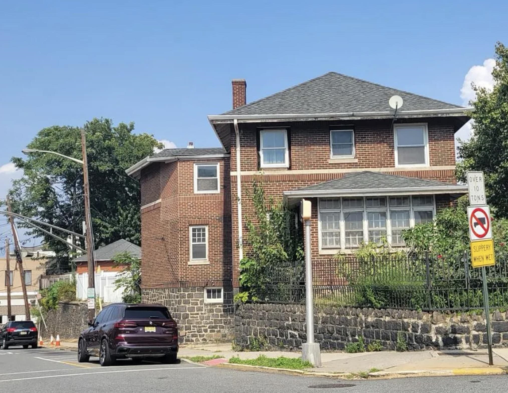 a car parked in front of a house