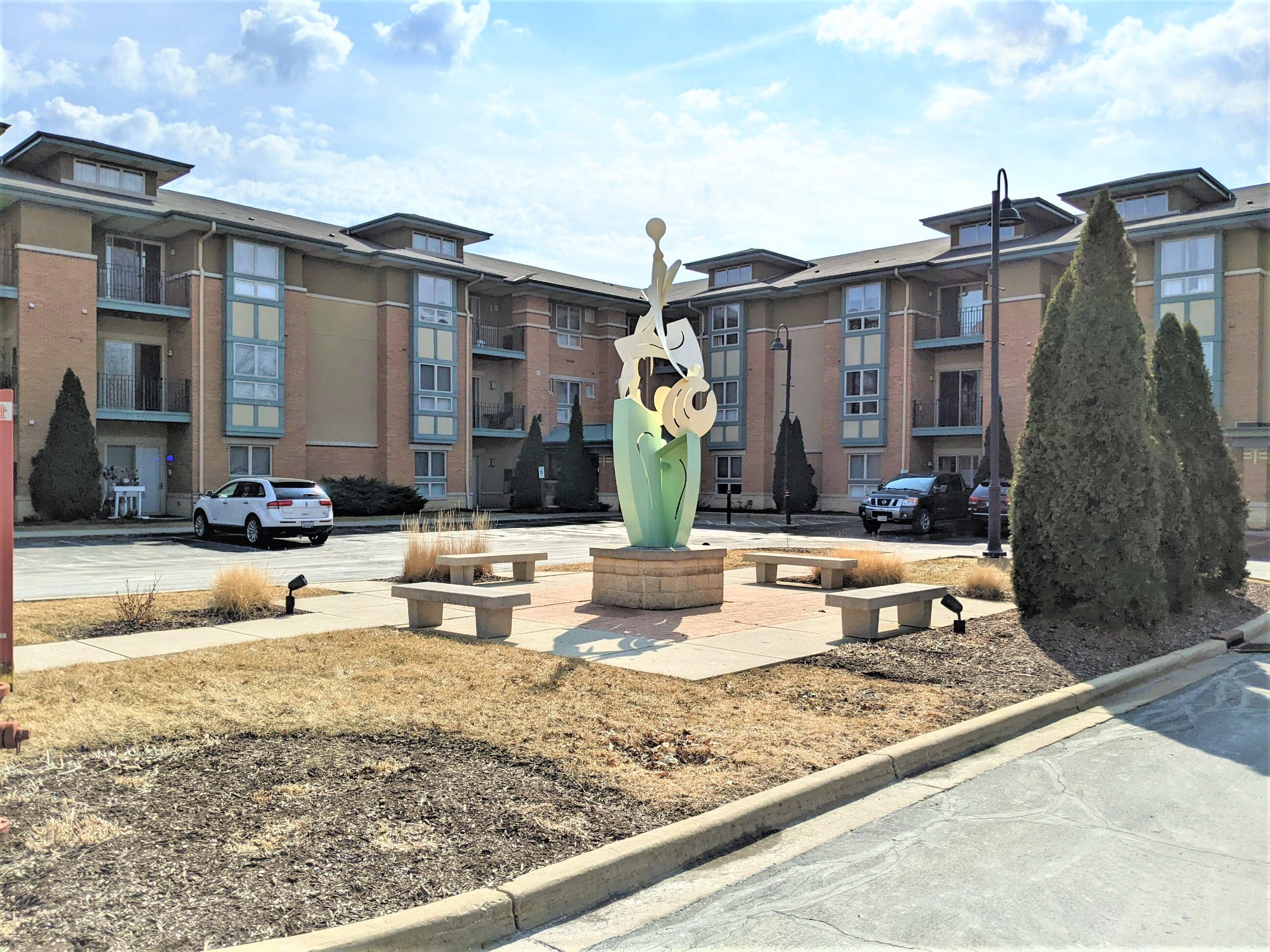 Front parking lot with fountain