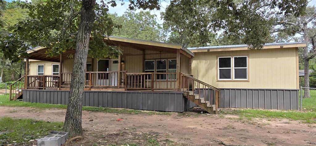 front view of a house with a fence