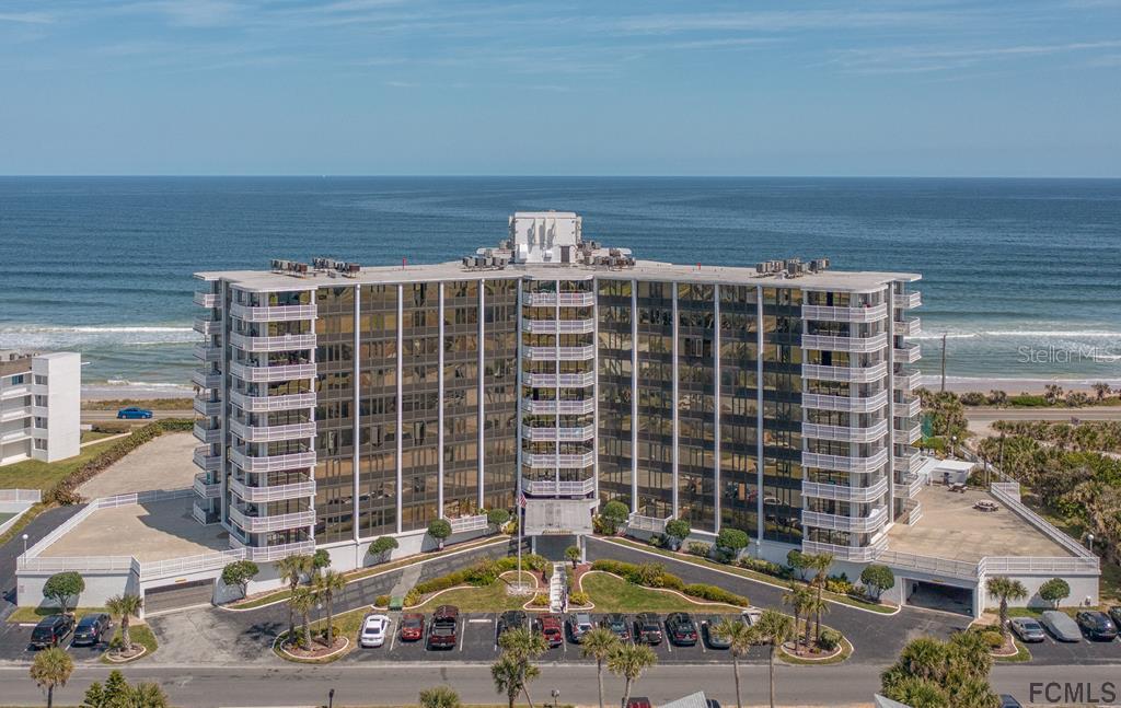 a view of a building with a street